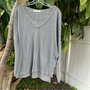 Free People We The Free V-Neck  Long Sleeve in Grey with a Raw Hem